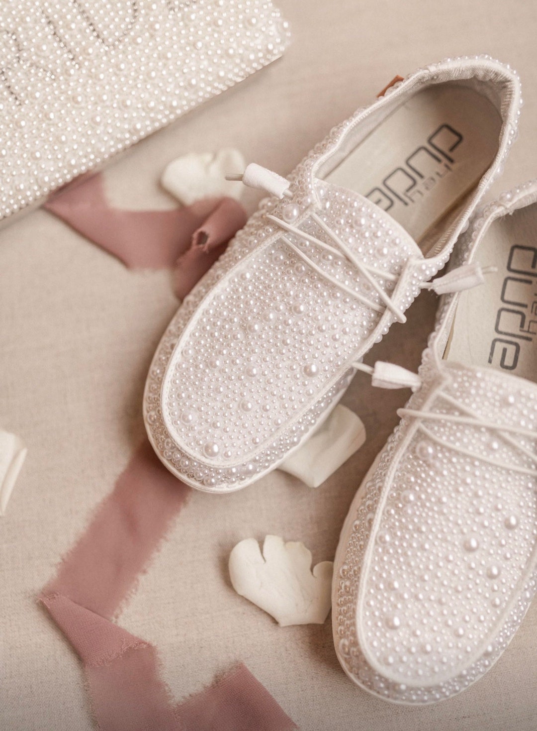 white and silver sneakers