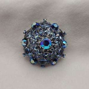 Broche de pedrería azul vintage brillante