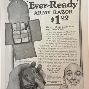 May include: Vintage advertisement for the 'Ever-Ready' Army Razor, featuring a khaki case with razor and blades. The ad includes text and an illustration of a man shaving. The text reads "Ever-Ready Army Razor $1.00".