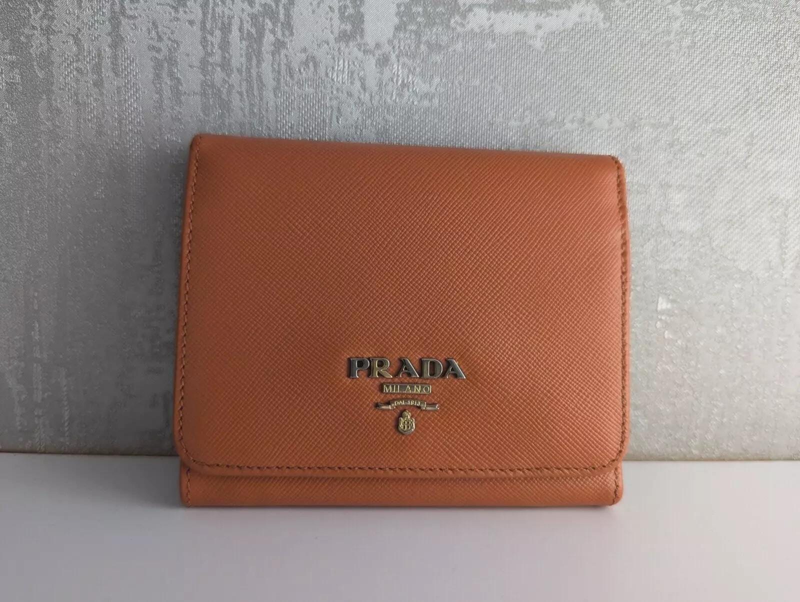 Prada saffiano trifold wallet best sale