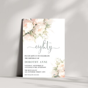 May include: A white invitation with a floral design in shades of pink and green. The text reads "eighty" and includes details for a birthday celebration for Dorothy Anne.