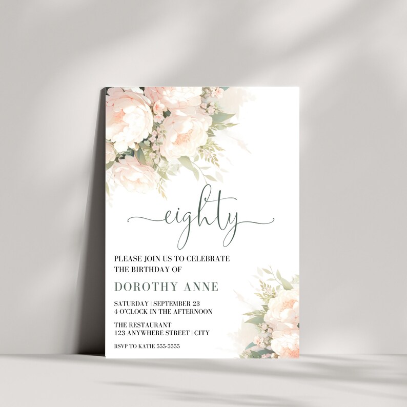 May include: A white invitation with a floral design in shades of pink and green. The text reads "eighty" and includes details for a birthday celebration for Dorothy Anne.