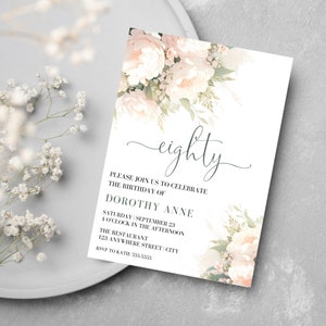 May include: A white invitation card with a floral design in shades of pink and green. The text on the card reads "eighty" and includes details for a birthday celebration for Dorothy Anne.