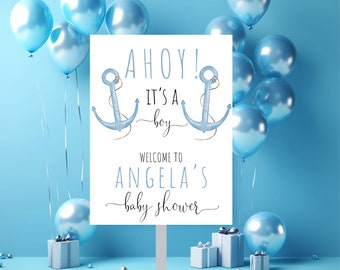 Könnte beinhalten: Ein Ahoy! Es ist ein Junge Babyparty-Schild mit zwei blauen Ankern und dem Text "Willkommen zur Babyparty von Angela".
