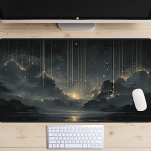 May include: A rectangular mousepad featuring a dark, artistic landscape with a celestial theme. The design includes dark clouds, a glowing light source, and golden accents. A white mouse and keyboard are visible.