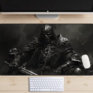 May include: A black and white illustration of a knight in armor with a skull-like helmet and a sword. The knight is sitting on a throne and has a dark cloak.