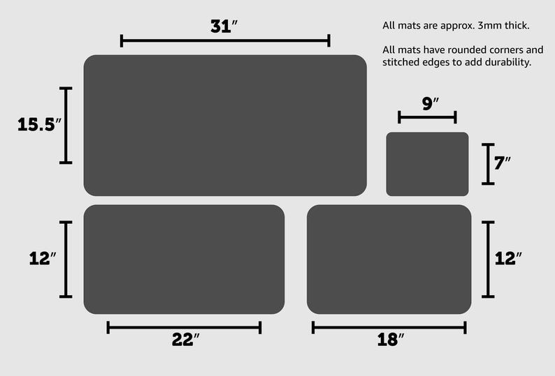 May include: Four gray rectangular mats of different sizes. The largest mat is 31 inches by 15.5 inches. The second largest mat is 22 inches by 12 inches. The third largest mat is 18 inches by 12 inches. The smallest mat is 9 inches by 7 inches. All mats are approximately 3mm thick and have rounded corners and stitched edges.