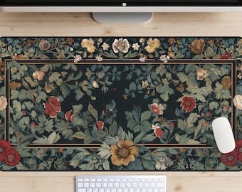 May include: A rectangular desk mat featuring a dark background with a floral design. The design includes red, yellow, and cream-colored flowers, along with green leaves. A gold border frames the floral pattern. A white mouse and keyboard are visible.