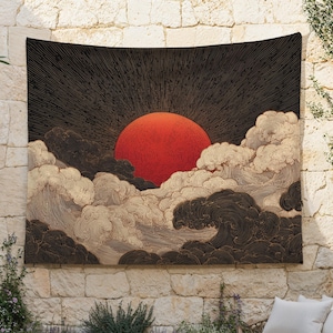 May include: A tapestry featuring a stylized sunrise scene. A large red sun is centered, radiating light against a dark background. Below, swirling clouds and waves in shades of beige and brown create a dramatic effect.