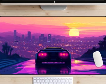 May include: A black sports car drives down a road with a city skyline in the background. The sky is a vibrant pink and orange with a large yellow sun setting in the distance.