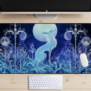 May include: A blue and white mouse mat featuring a stylised illustration of a fox standing in a field of flowers beneath a full moon. The fox is facing the right side of the image and has its head tilted upwards. The background is a dark blue with white and blue flowers and vines.