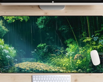 May include: A rectangular mousepad featuring a serene forest scene with a stone path leading into the distance. The artwork depicts lush green foliage, bamboo, and a gentle rain. A white mouse and keyboard are visible.