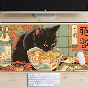 May include: A black cat with yellow eyes is eating ramen noodles from a blue and white bowl. The bowl is on a wooden table with a bottle of sake, a cup of tea, and a computer mouse. The background is a vintage Japanese-style illustration with the text "ラーメン" (Ramen) and "大関" (Ozeki).