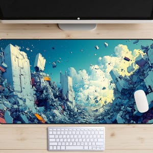 Pode incluir: Um tapete de rato de design abstrato azul e branco com uma cidade em ruínas e nuvens. O tapete de rato é feito de um material macio e durável e é perfeito para jogadores e qualquer pessoa que passe muito tempo no seu computador.