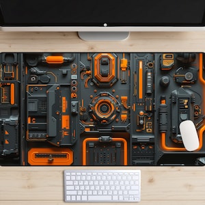 May include: A black and orange gaming mouse mat with a futuristic design featuring a variety of gears, pipes, and other mechanical elements.