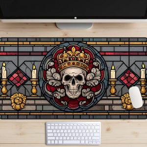 May include: A decorative mousepad featuring a skull wearing a gold crown, set against a stained-glass window design. The design includes red, gray, and gold accents, with candles and floral elements. A white mouse and keyboard are visible.