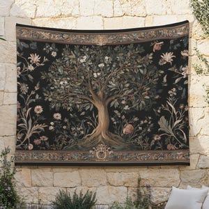 May include: A large tapestry featuring a detailed illustration of a tree with sprawling branches and leaves, set against a black background. The design includes floral elements and a decorative border in shades of brown, beige, and green. The tapestry is displayed on a stone wall.