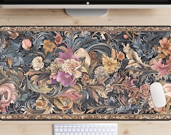May include: A decorative desk mat featuring a detailed floral pattern in shades of pink, yellow, and blue on a dark background. The design includes ornate leaves and flowers, with a gold border. A white mouse and keyboard are visible.