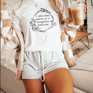A Well Read Woman Is A Dangerous Creature, black print, floral wreath, book lover, reader t-shirt