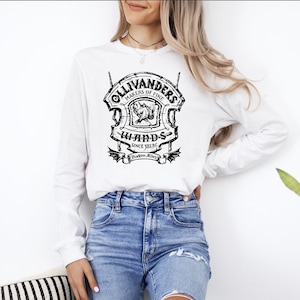 Ollivander&#39;s Maker Of Fine Wands, shop sign, wizard, book love Long Sleeve Tee