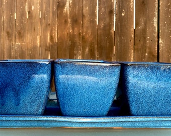 Ensemble de jardinières flottantes en terre cuite émaillée bleue