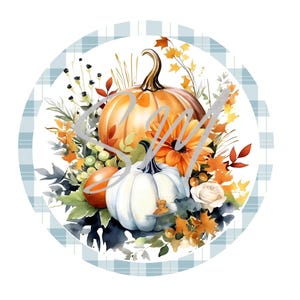 May include: A round, blue and white checkered background with a watercolor painting of pumpkins, fall leaves, and flowers. The pumpkins are orange and white, and the leaves are red, orange, and yellow.