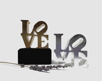 1970s 'Love' Sculptures Paperweights | Pop Art Iconic Gold Toned and Silver Toned Paperweights | Mid Century Modern Design
