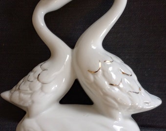 Porcelain kissing ducks