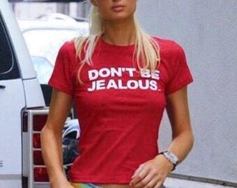 Paris Hilton Baby T-Shirt - T-Shirt mit dem Slogan „Don’t be Jealous“ (auf deutsch: Don’t be Jealous)