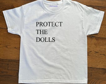 Slogan Baby Tee - 'Protect The Dolls' Cropped T-Shirt, Y2K Coquette Aesthetic, Tshirt Print, 90s - 2000s Style, Trendy Cute Crop Top
