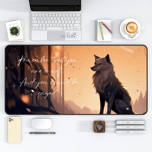 May include: A black and brown wolf sits in a forest with a sunset in the background. The text "Remember that you are a wolf. And you cannot be caged." is written on the image.