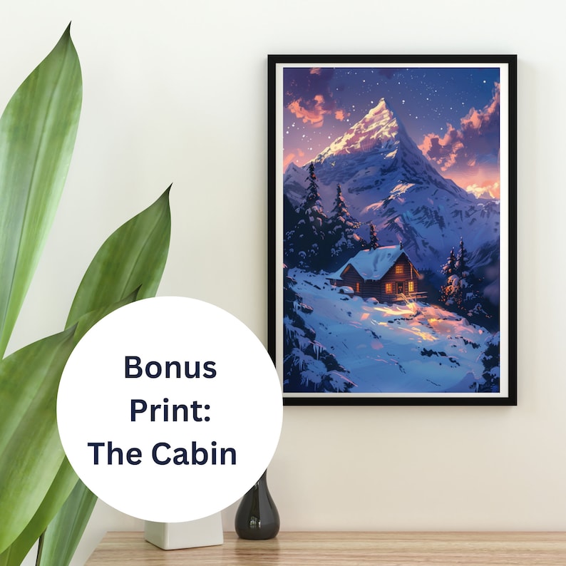 May include: A framed print of a snowy mountain scene with a small cabin nestled in the snow. The sky is a deep blue with stars and a pink sunset. The cabin has a warm glow coming from the windows.