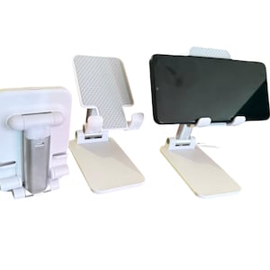 Foldable Adjustable Metal Phone Stand – Compact Desk Holder for Smartphones & Tablets