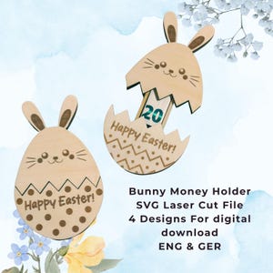 May include: Two wooden Easter bunny money holders. One is an egg shape with a bunny face and the words "Happy Easter!". The other is an egg cracked open with a bunny face and the words "Happy Easter!" and the number 20.