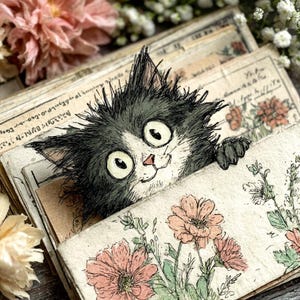 May include: A whimsical illustration of a black and white cat peeking over a stack of vintage-style papers. The papers feature floral drawings and handwritten text. The cat has large, expressive eyes and a playful expression, adding a touch of charm.