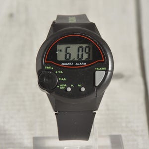 Vintage Ultmost Talking Watch, Working, fitted with new battery. The strap is in good condition, as is the whole watch. For collectors?