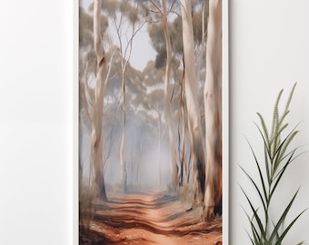 May include: A framed painting of a dirt path leading through a misty forest with tall, white eucalyptus trees. The path is lined with trees and the light is soft and diffused.