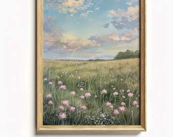 May include: A framed painting of a field of wildflowers with a blue sky and white clouds in the background. The flowers are pink and white and the field is green.