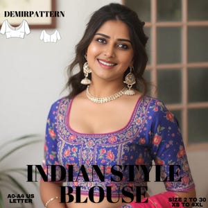May include: A blue and pink Indian style blouse with gold embroidery. The blouse has a scoop neckline and short sleeves. The text "INDIAN STYLE BLOUSE" is written in black letters on the front of the blouse. The text "SIZE 2 TO 30 XS TO 4XL" is written in black letters on the bottom right corner of the image.