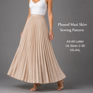 May include: A beige pleated maxi skirt with a high waistband. The text on the right reads: Pleated Maxi Skirt Sewing Pattern, A4 A0 Letter, US Sizes 2-30, XS-4XL. The skirt is worn with a white sleeveless top and beige heeled sandals.