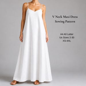 May include: A white maxi dress with a V-neckline and thin spaghetti straps. The text reads: V Neck Maxi Dress Sewing Pattern, A4 A0 Letter, US Sizes 2-30, XS-4XL. The dress features a floor-length, loose-fitting silhouette with a simple design.