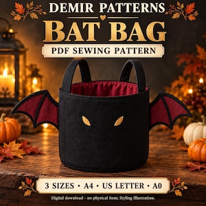 May include: A black fabric bucket bag with two handles, featuring dark red bat wings on the sides and two yellow embroidered eyes on the front. The interior is lined with dark red fabric. Text reads: DEMIR PATTERNS BAT BAG PDF SEWING PATTERN 3 SIZES A4 US LETTER A0.