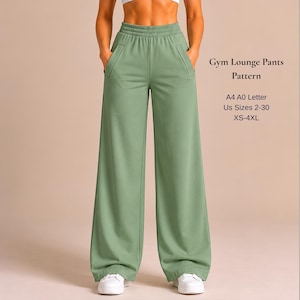 May include: Sage green wide-leg lounge trousers with an elastic waistband and side pockets. Text reads: Gym Lounge Pants Pattern, A4 A0 Letter, US Sizes 2-30, XS-4XL. The trousers feature a loose, straight-leg silhouette and are paired with white trainers.