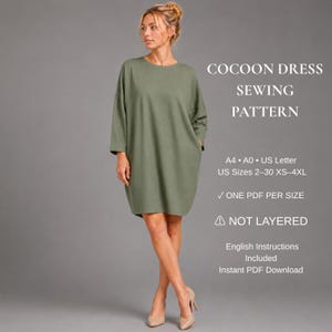 May include: A sage green cocoon dress with long sleeves and a round neckline. Text reads: COCOON DRESS SEWING PATTERN, A4, A0, US Letter, US Sizes 2-30 XS-4XL, ONE PDF PER SIZE, NOT LAYERED, English Instructions Included, Instant PDF Download.