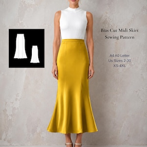 May include: A woman wearing a white sleeveless top and a mustard yellow bias-cut midi skirt. The skirt has a flared hem. Text on the image reads "Bias Cut Midi Skirt Sewing Pattern" and "Us Sizes 2-30 XS-4XL".