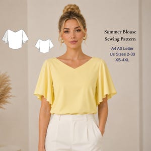 May include: A woman in a yellow summer blouse with a V-neck and flared sleeves, paired with white trousers. The image includes text: "Summer Blouse Sewing Pattern" and size details.