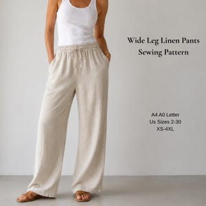 May include: Wide leg linen pants sewing pattern in beige with an elastic waistband and drawstring. Text reads: Wide Leg Linen Pants Sewing Pattern, A4 A0 Letter, US Sizes 2-30, XS-4XL. The pants feature a loose fit and side pockets.