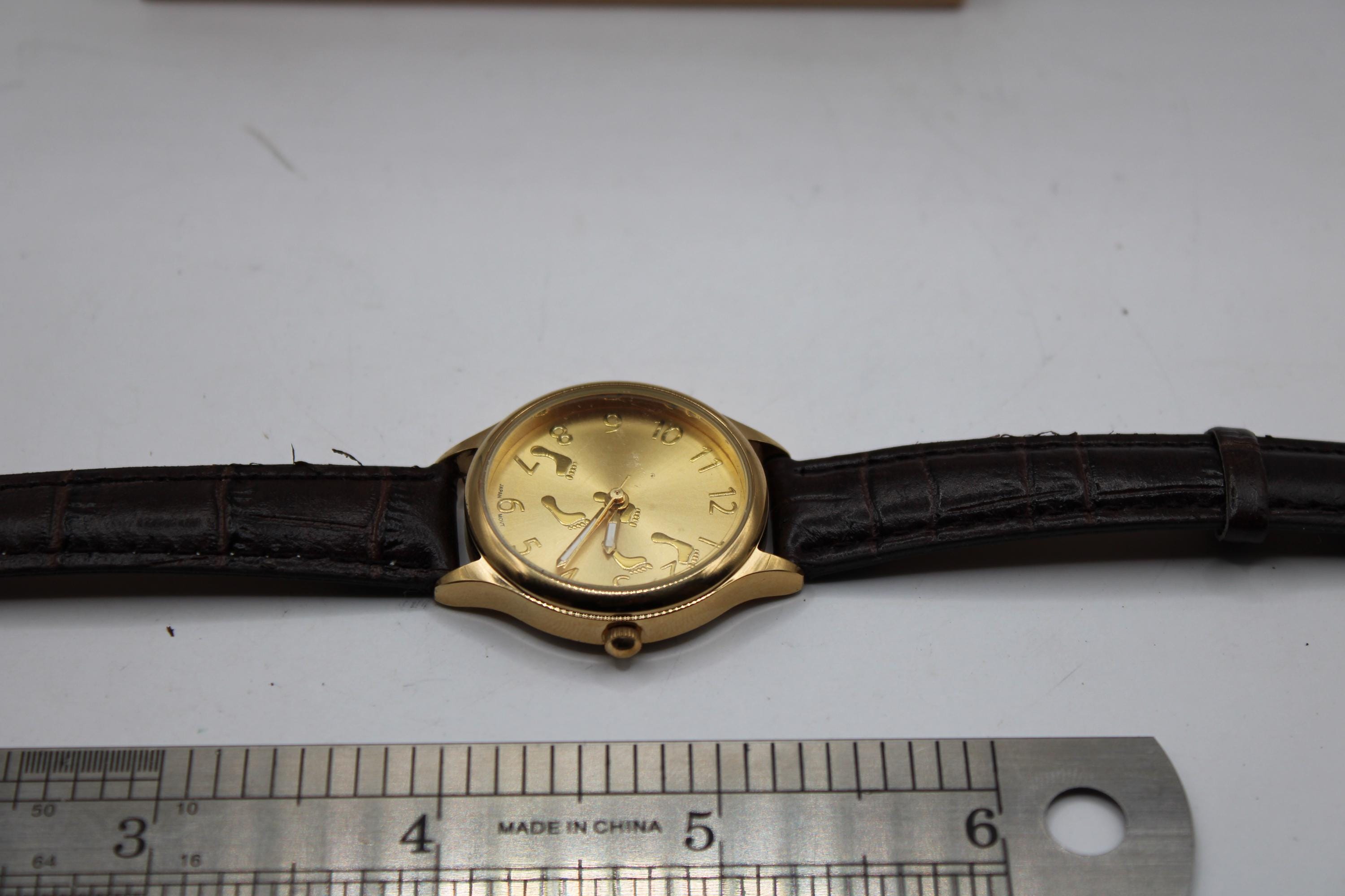 Vtg Gold Tone Brown Band Footprint Women's Wrist Watch Etched Backing ...