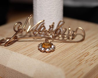 Unique Bent Gold Tone Metal Mother Pin with Rhinestone Circle Drop