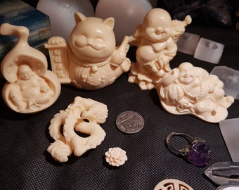 Tagua nut lucky trinkets laughing buddhas dragon heads and lucky cat